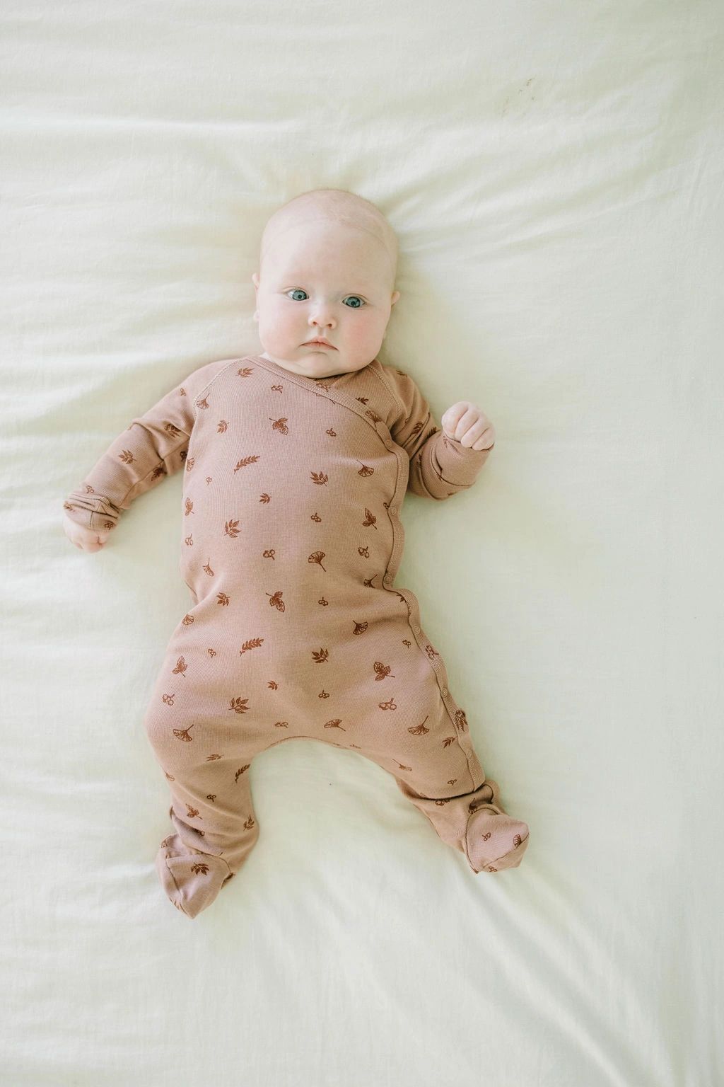 Koalav long sleeve asymmetric snap front footed coverall in rose dust