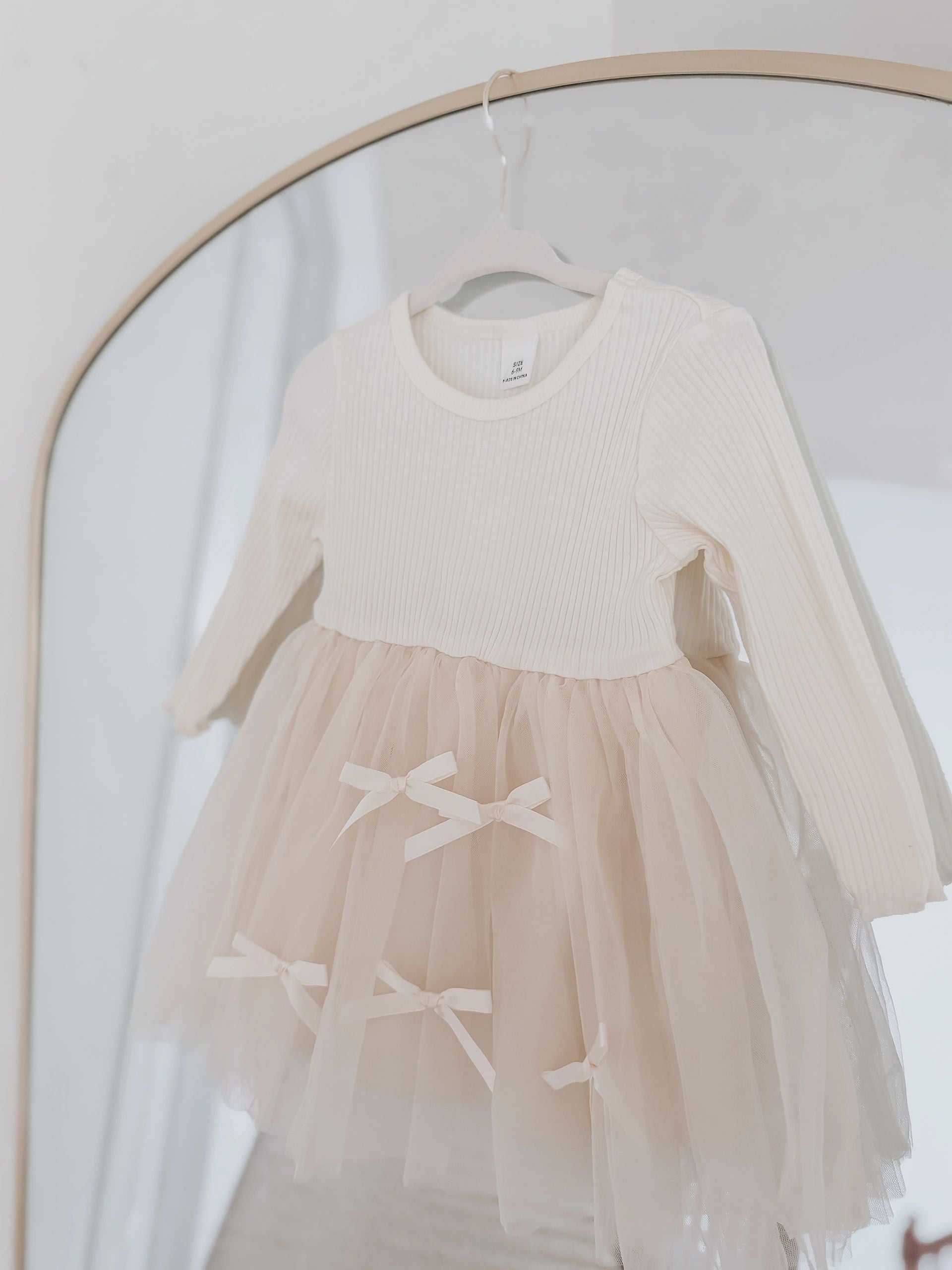 The Snug Baby Company long sleeve baby doll tulle dress with 3D bows