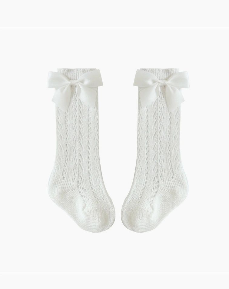 The Snug Baby Company crochet high sock with grossgrain bow