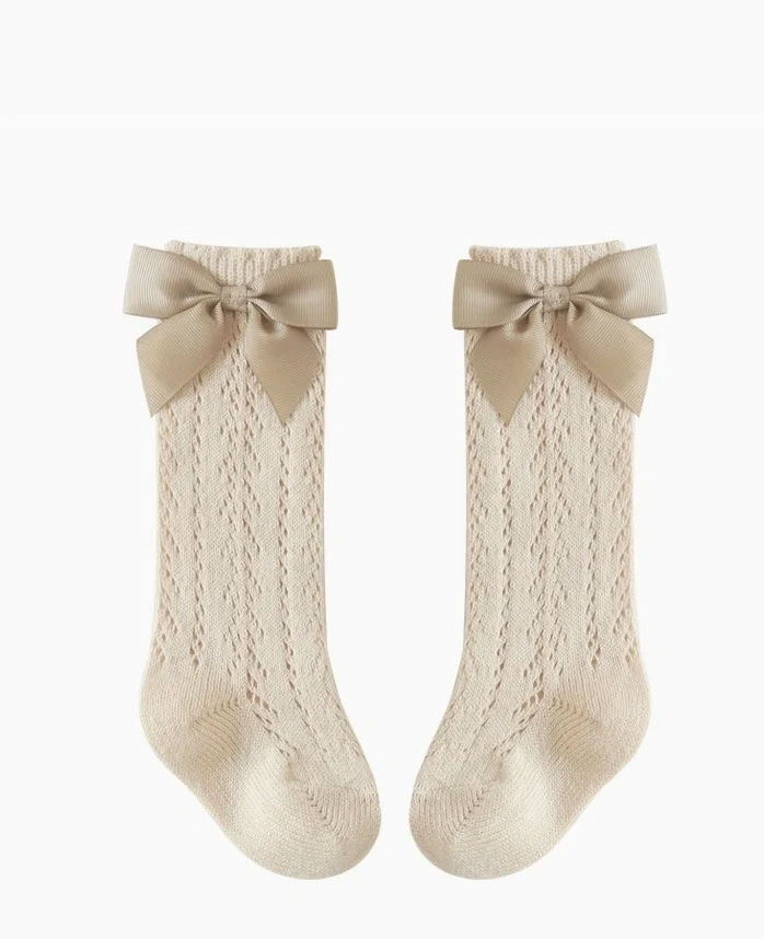The Snug Baby Company crochet high sock with grossgrain bow